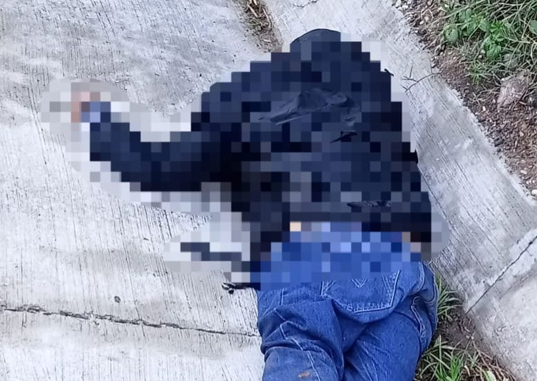 Hallan cadáver de hombre en zanja de riego en Tetepango