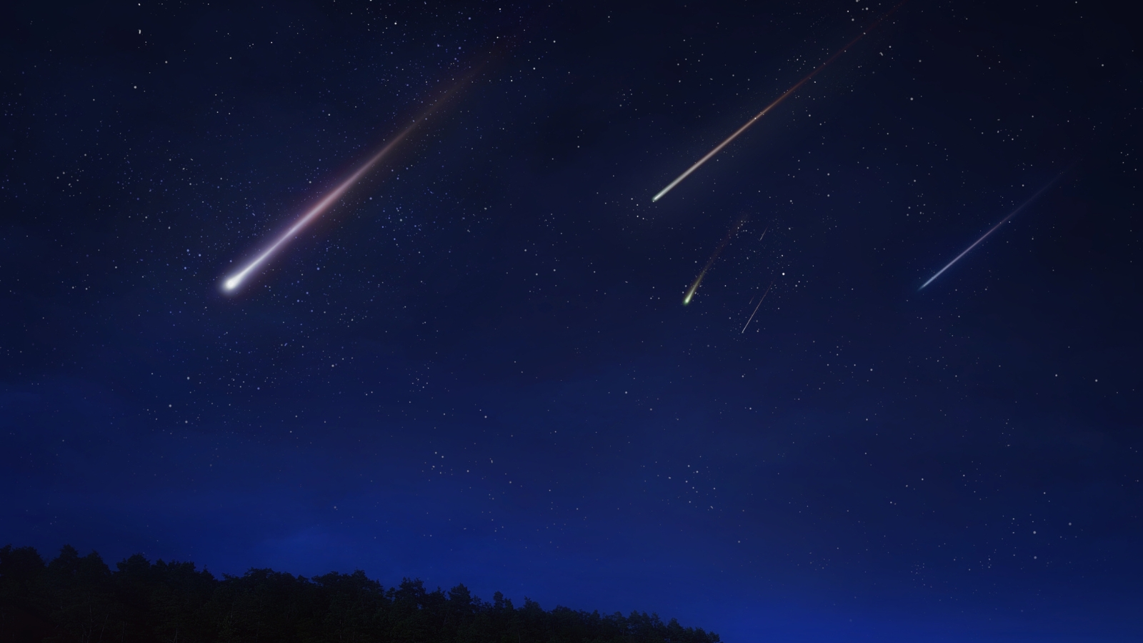 Lluvia de meteoros Oriónidas con destellos luminosos en el cielo nocturno.